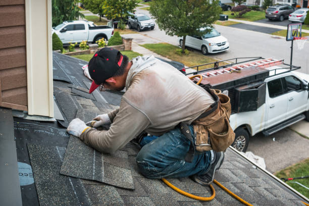 Professional Flat Roof Repair technician working in Venice, IL